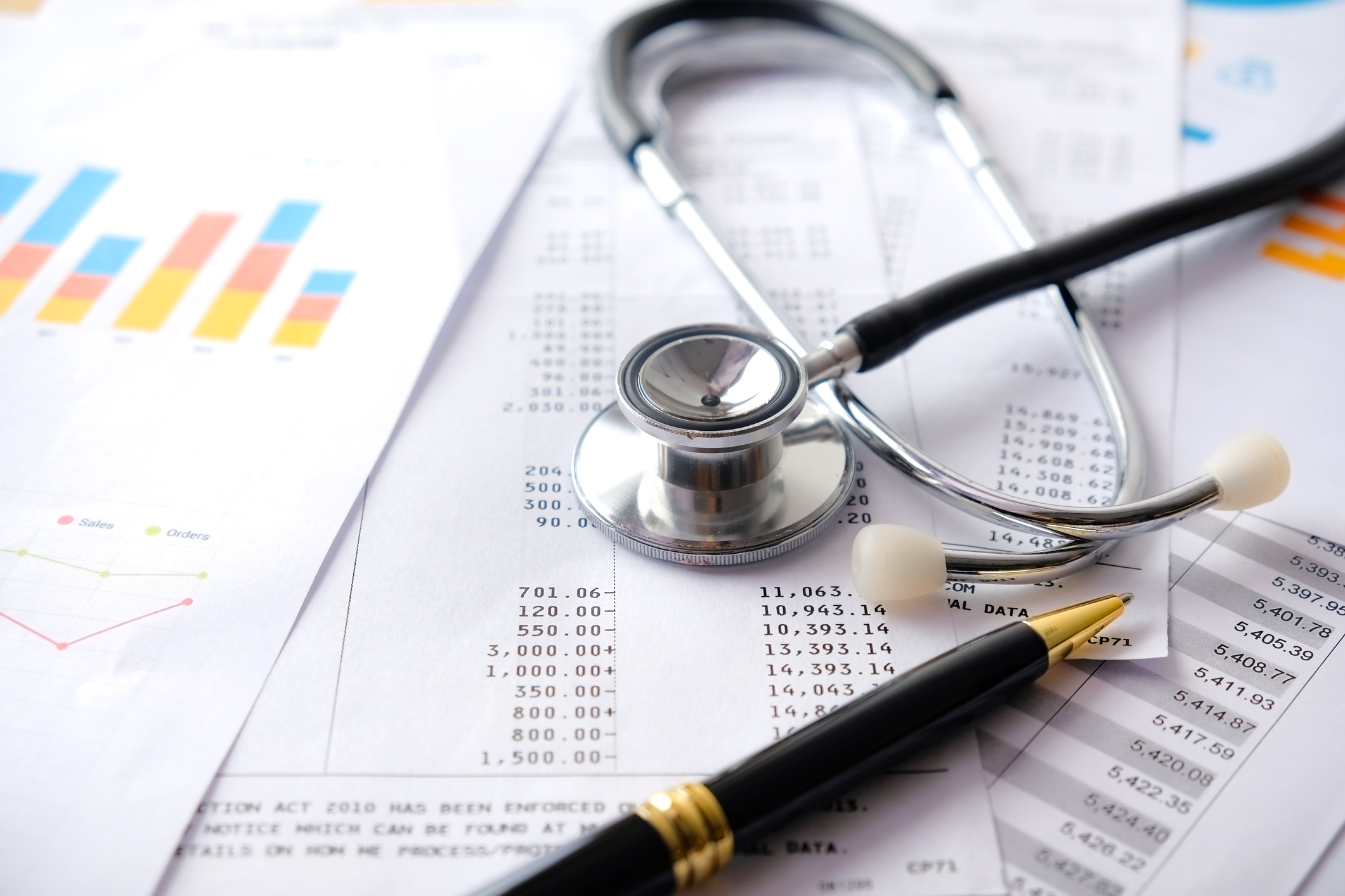 Stethoscope with Pen, Charts and Graphs